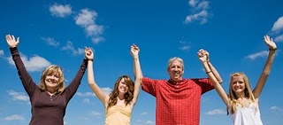 A Healthy Family, Arms Raised to the Sky